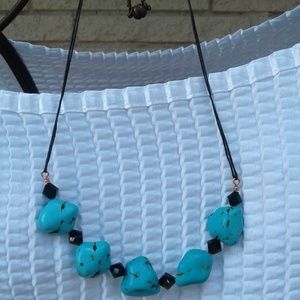 Faux turquoise necklace.